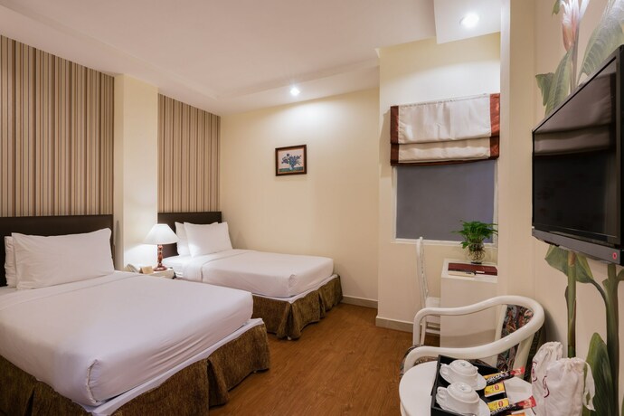 Imagen de la habitación del Hotel Asian Ruby Center Point. Foto 12