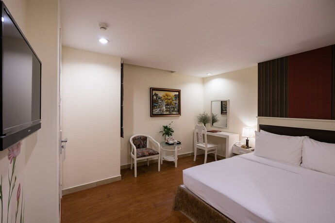 Imagen de la habitación del Hotel Asian Ruby Center Point. Foto 14
