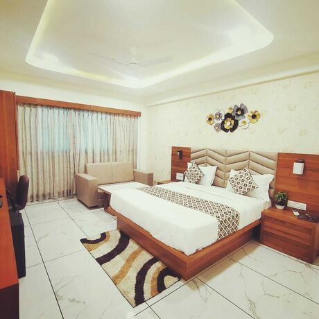 Imagen de la habitación del Hotel Asiana Ahmedabad. Foto 12