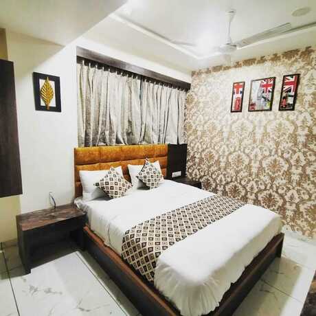 Imagen de la habitación del Hotel Asiana Ahmedabad. Foto 14