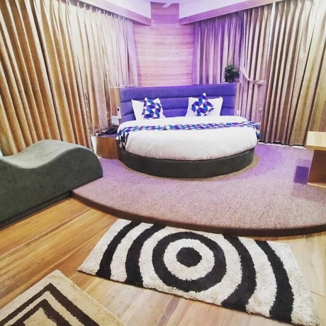 Imagen de la habitación del Hotel Asiana Ahmedabad. Foto 16