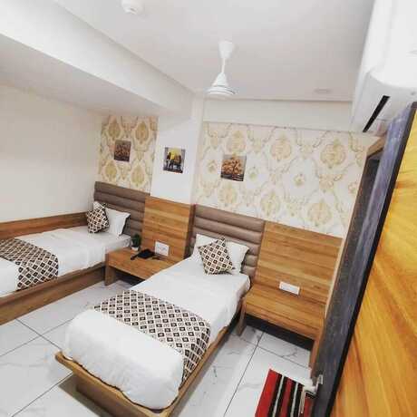 Imagen de la habitación del Hotel Asiana Ahmedabad. Foto 17