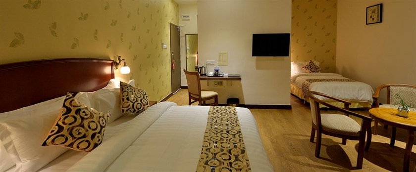 Imagen de la habitación del Hotel Asiana. Foto 7