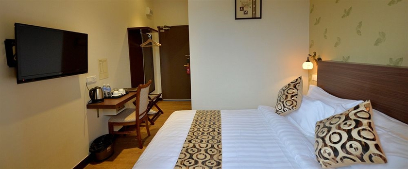 Imagen de la habitación del Hotel Asiana. Foto 8