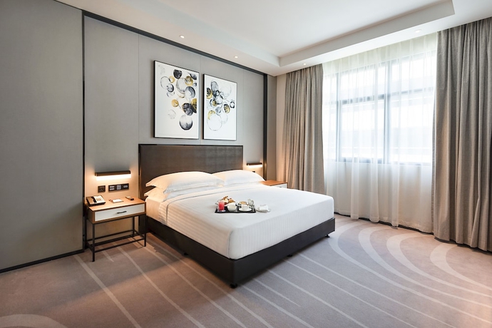 Imagen de la habitación del Hotel Asiana Grand. Foto 2