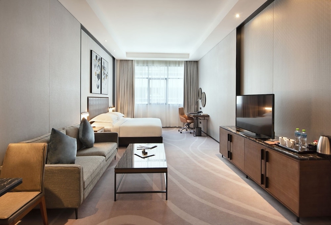 Imagen de la habitación del Hotel Asiana Grand. Foto 17