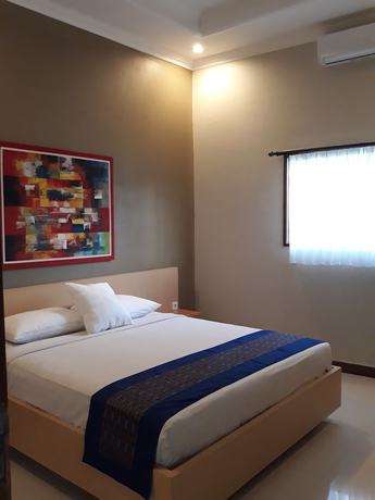Imagen de la habitación del Hotel Asiana Lovina. Foto 8