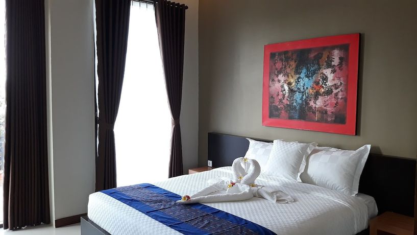 Imagen de la habitación del Hotel Asiana Lovina. Foto 11