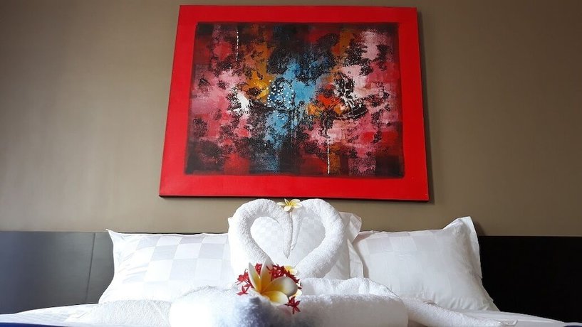 Imagen de la habitación del Hotel Asiana Lovina. Foto 12