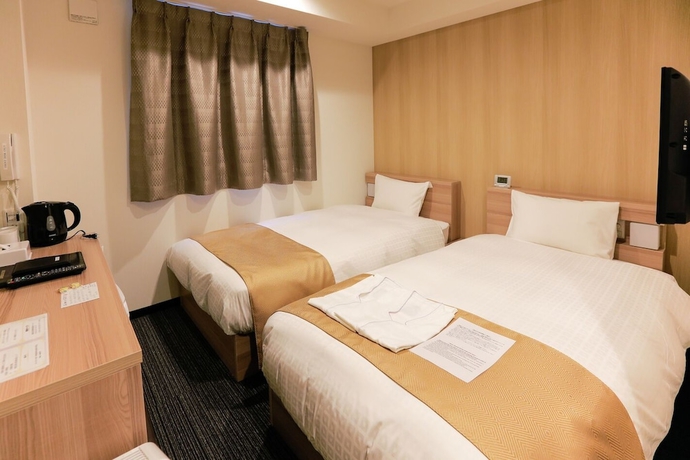 Imagen de la habitación del Hotel Asiato. Foto 7