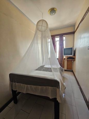 Imagen de la habitación del Hotel Asis Eldoret. Foto 12