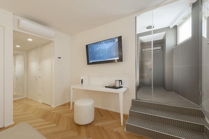 Imagen de la habitación del Hotel Asisium Boutique. Foto 16