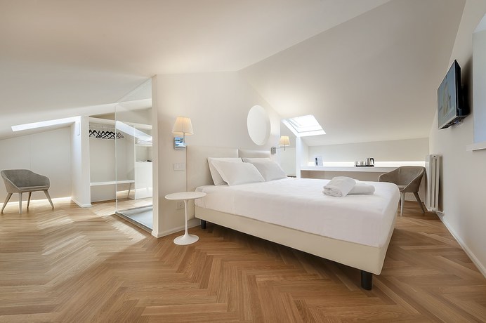 Imagen de la habitación del Hotel Asisium Boutique. Foto 17