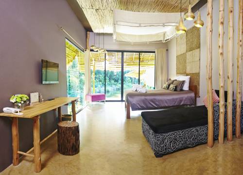 Imagen de la habitación del Hotel Asita Eco Resort. Foto 14