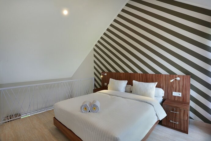 Imagen de la habitación del Hotel Askara Canggu Townhouse. Foto 19