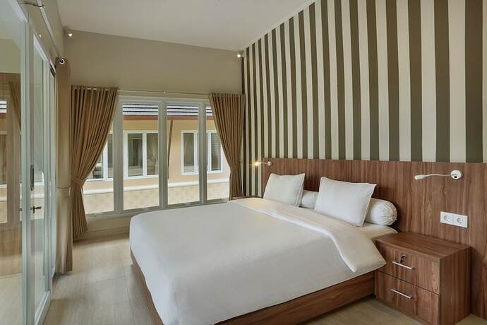 Imagen de la habitación del Hotel Askara Canggu Townhouse. Foto 21