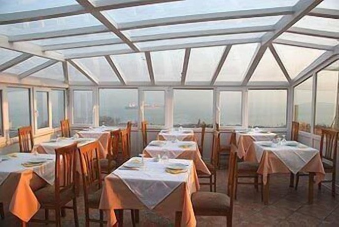 Imagen del bar/restaurante del Hotel Askin. Foto 1