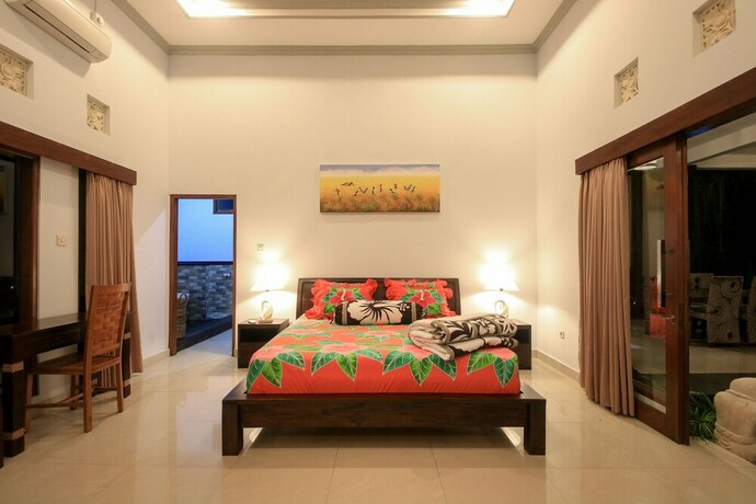 Imagen de la habitación del Hotel Asli Bali Villa. Foto 19