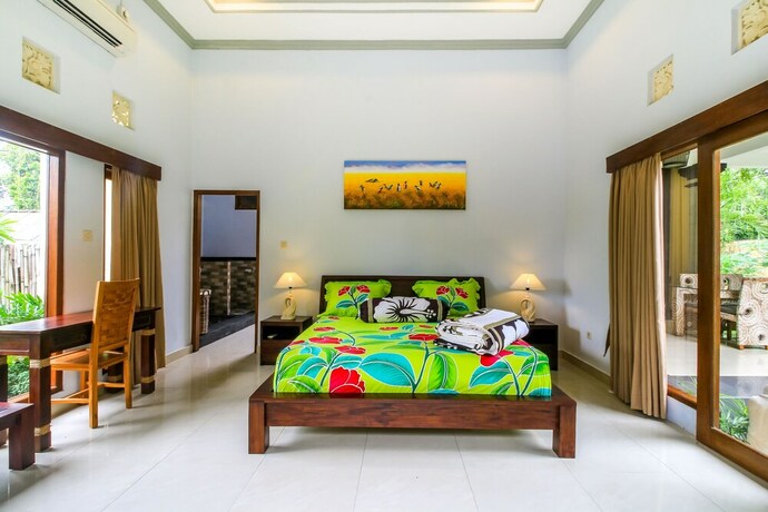Imagen de la habitación del Hotel Asli Bali Villa. Foto 21