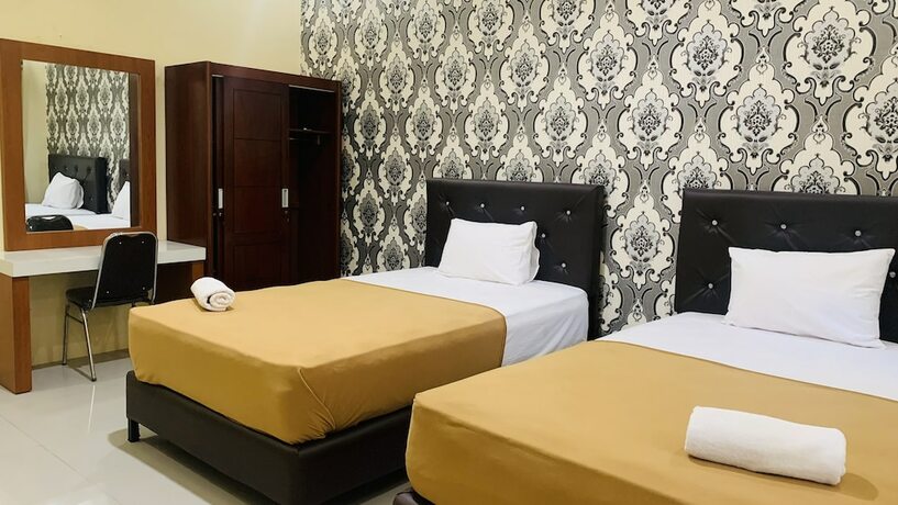 Imagen de la habitación del Hotel Asmi. Foto 20