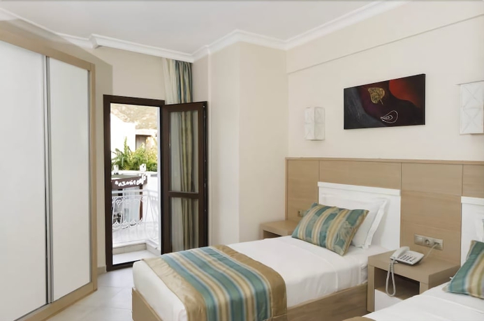 Imagen de la habitación del Hotel Asmin Bodrum. Foto 9
