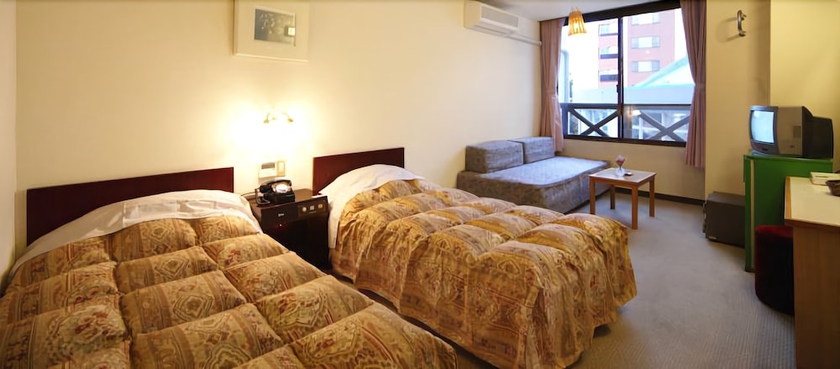 Imagen de la habitación del Hotel Aso Villa Park and Spa Resort. Foto 10