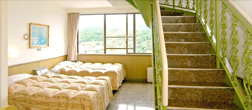 Imagen de la habitación del Hotel Aso Villa Park and Spa Resort. Foto 12