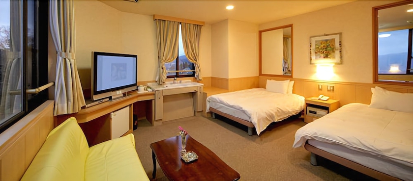 Imagen de la habitación del Hotel Aso Villa Park and Spa Resort. Foto 14