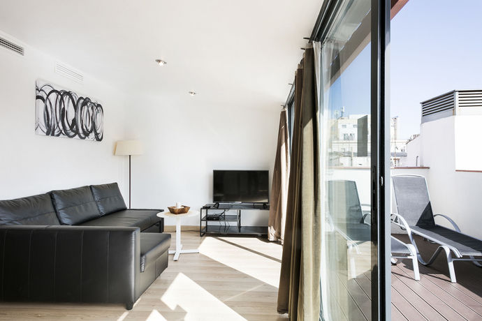 Imagen de la habitación del Hotel Aspasios Las Ramblas Apartments. Foto 2