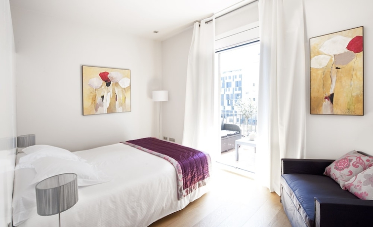 Imagen de la habitación del Hotel Aspasios Rambla Catalunya Suites. Foto 13