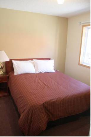 Imagen de la habitación del Hotel Aspen Village Inn. Foto 4