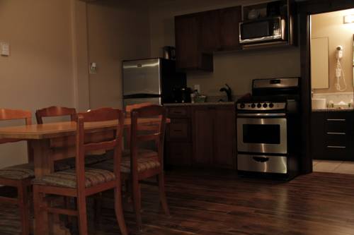 Imagen de la habitación del Hotel Aspen Village Inn. Foto 9