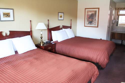 Imagen de la habitación del Hotel Aspen Village Inn. Foto 13