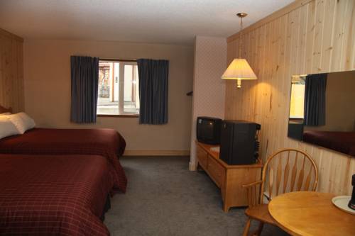 Imagen de la habitación del Hotel Aspen Village Inn. Foto 15