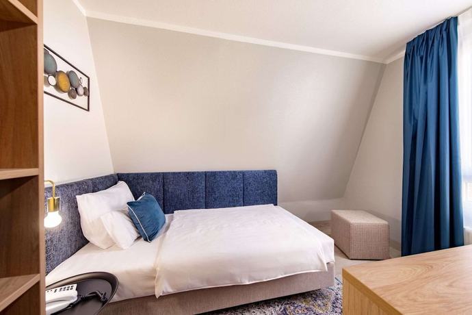 Imagen de la habitación del Hotel Aspire Elements Reutlingen, Trademark Collection By Wyndham. Foto 8