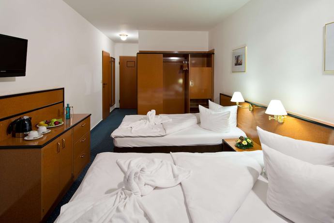 Imagen de la habitación del Hotel Aspire Frankfurt Airport, Trademark Collection by Wyndham. Foto 12