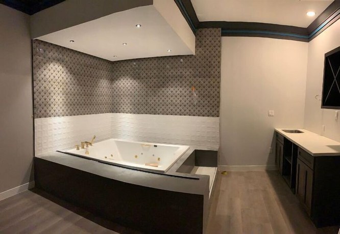 Imagen de la habitación del Hotel Aspire Inn Studios and Spas. Foto 2