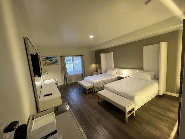 Imagen de la habitación del Hotel Aspire Inn and Suites Orange. Foto 18