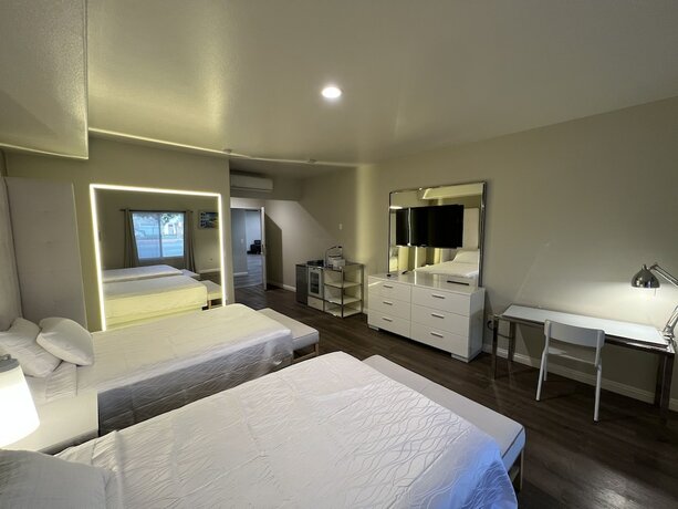 Imagen de la habitación del Hotel Aspire Inn and Suites Orange. Foto 19
