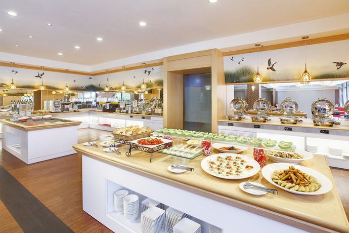 Imagen del bar/restaurante del Hotel Aspire Resort. Foto 6