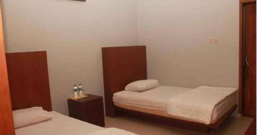 Imagen de la habitación del Hotel Asri Baru. Foto 17