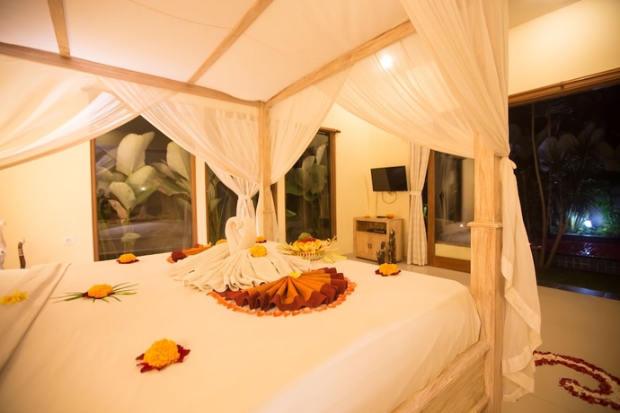 Imagen de la habitación del Hotel Asri Sari Resort Ubud. Foto 9