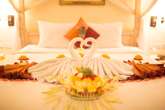 Imagen de la habitación del Hotel Asri Sari Resort Ubud. Foto 11