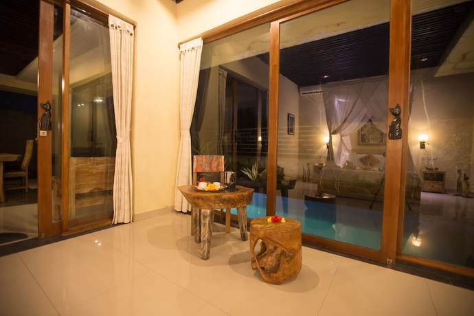 Imagen de la habitación del Hotel Asri Sari Resort Ubud. Foto 13