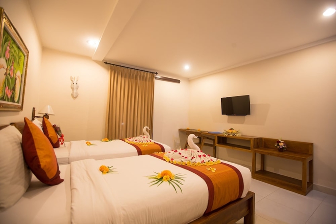 Imagen de la habitación del Hotel Asri Sari Resort Ubud. Foto 17