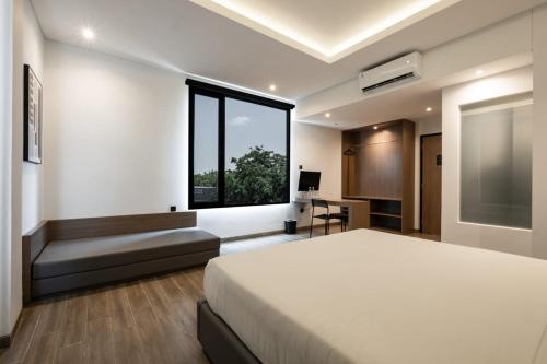 Imagen de la habitación del Hotel Assa. Foto 15