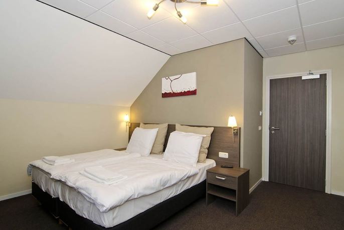 Imagen de la habitación del Hotel Asselt. Foto 2