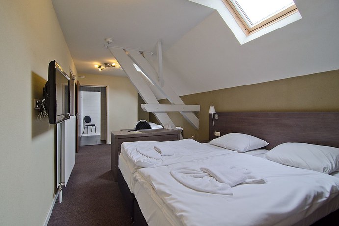 Imagen de la habitación del Hotel Asselt. Foto 8