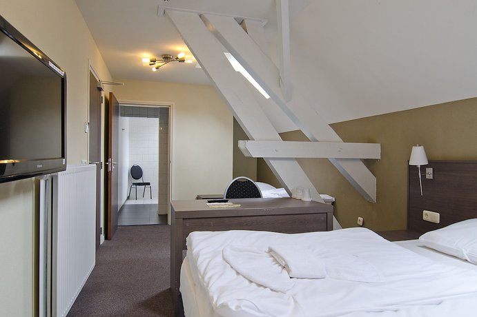 Imagen de la habitación del Hotel Asselt. Foto 10