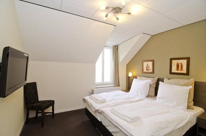 Imagen de la habitación del Hotel Asselt. Foto 11